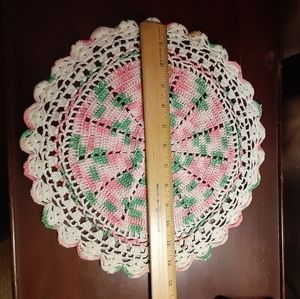 Pink, green, and white vintage doily